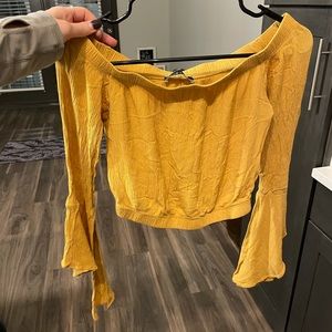 Boutique off the shoulder shirt